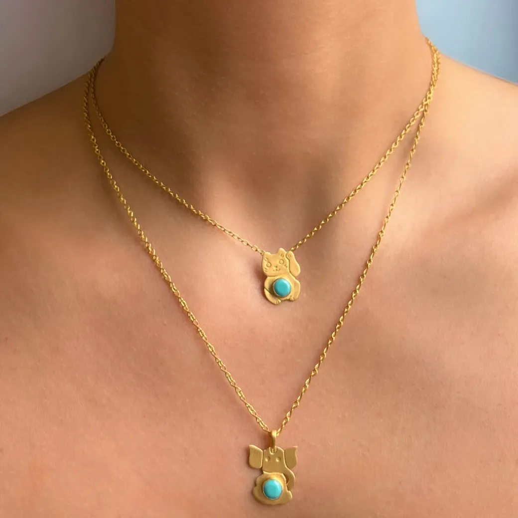 pendentif_ganesh_turquois_1.webp Pendentif Ganesh Turquoise